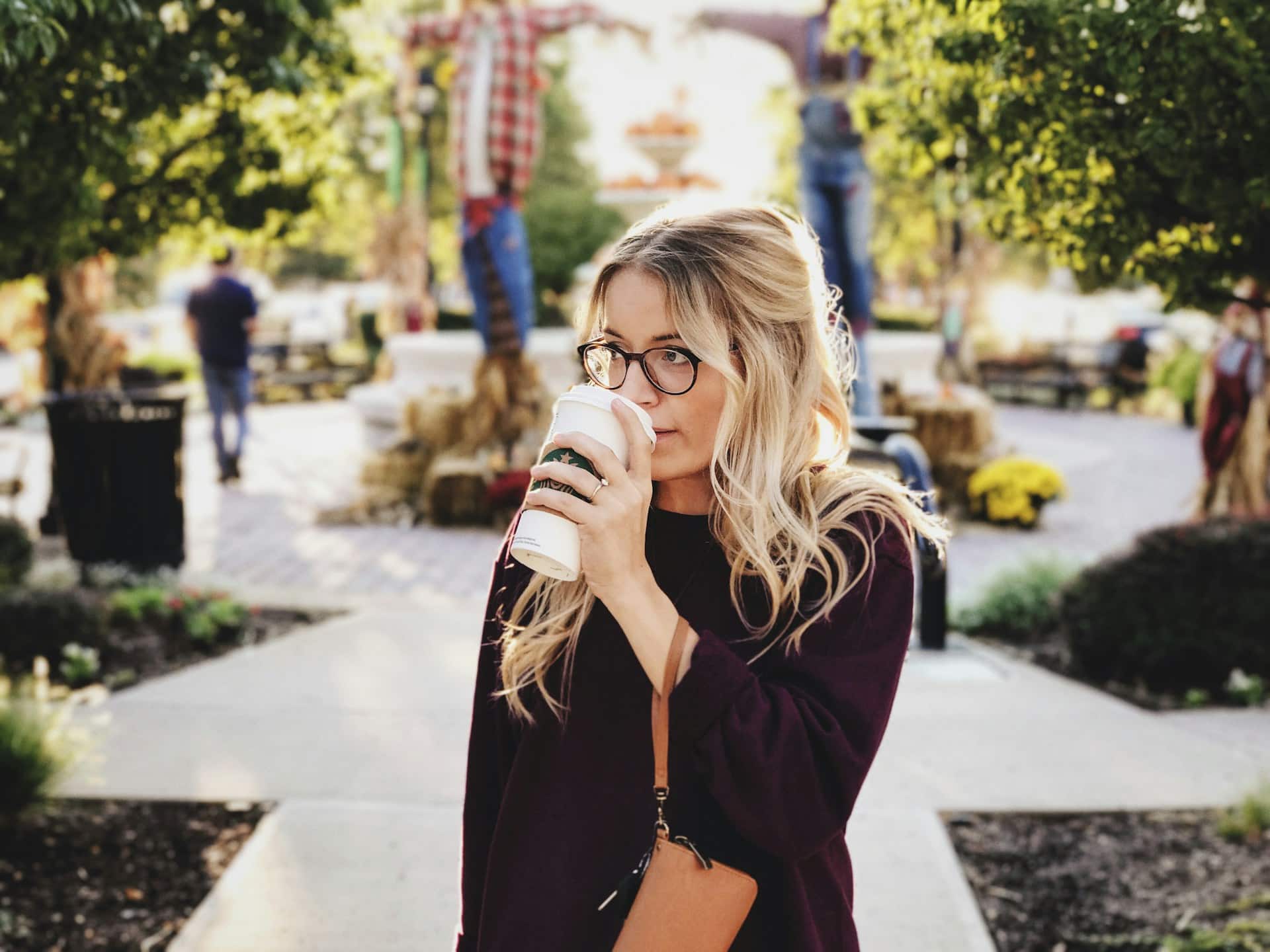 a woman drinking coffee in the morning